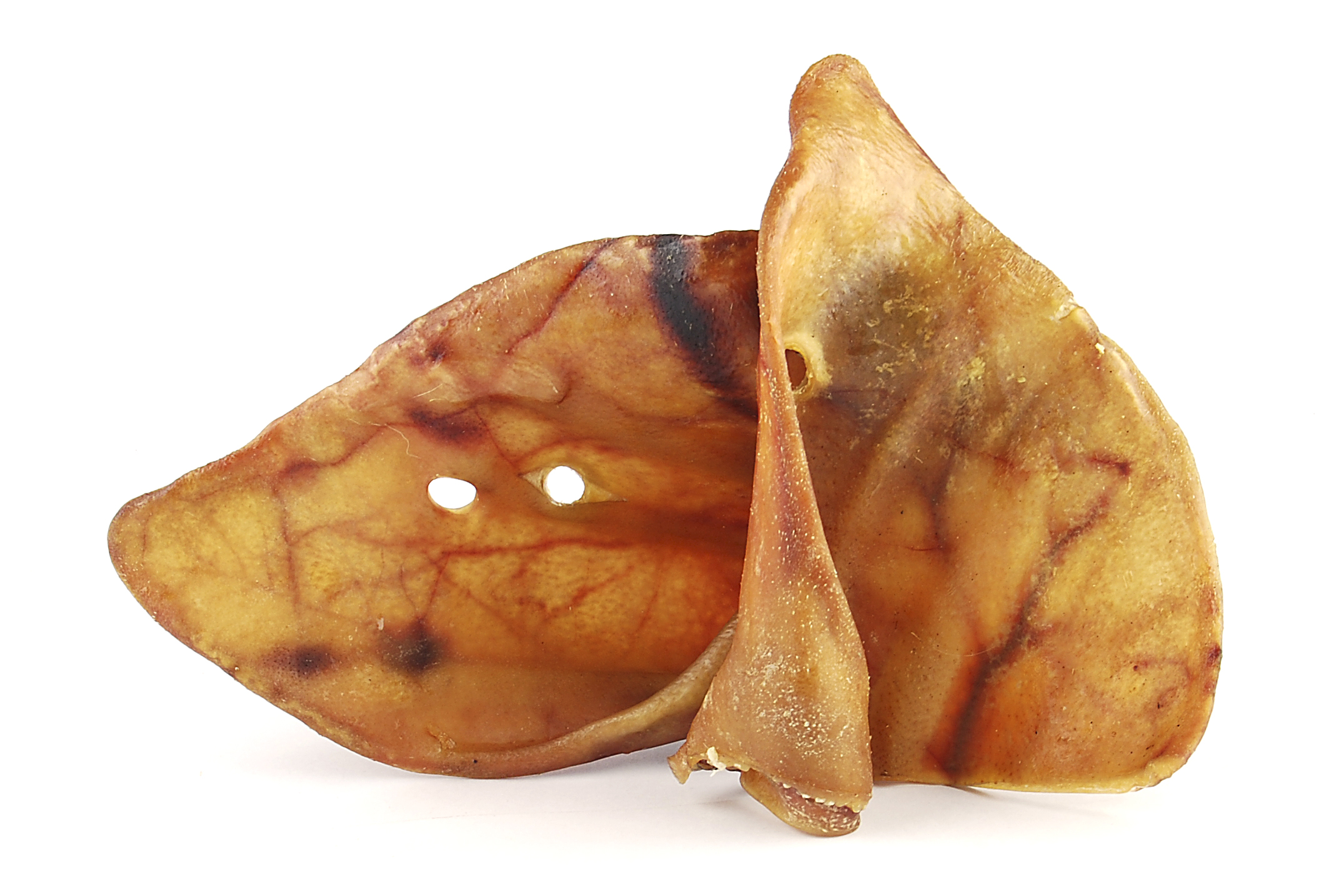 Schweineohr, getrocknet, braun, naturbelassen, zwei Stück, Detailaufnahme.